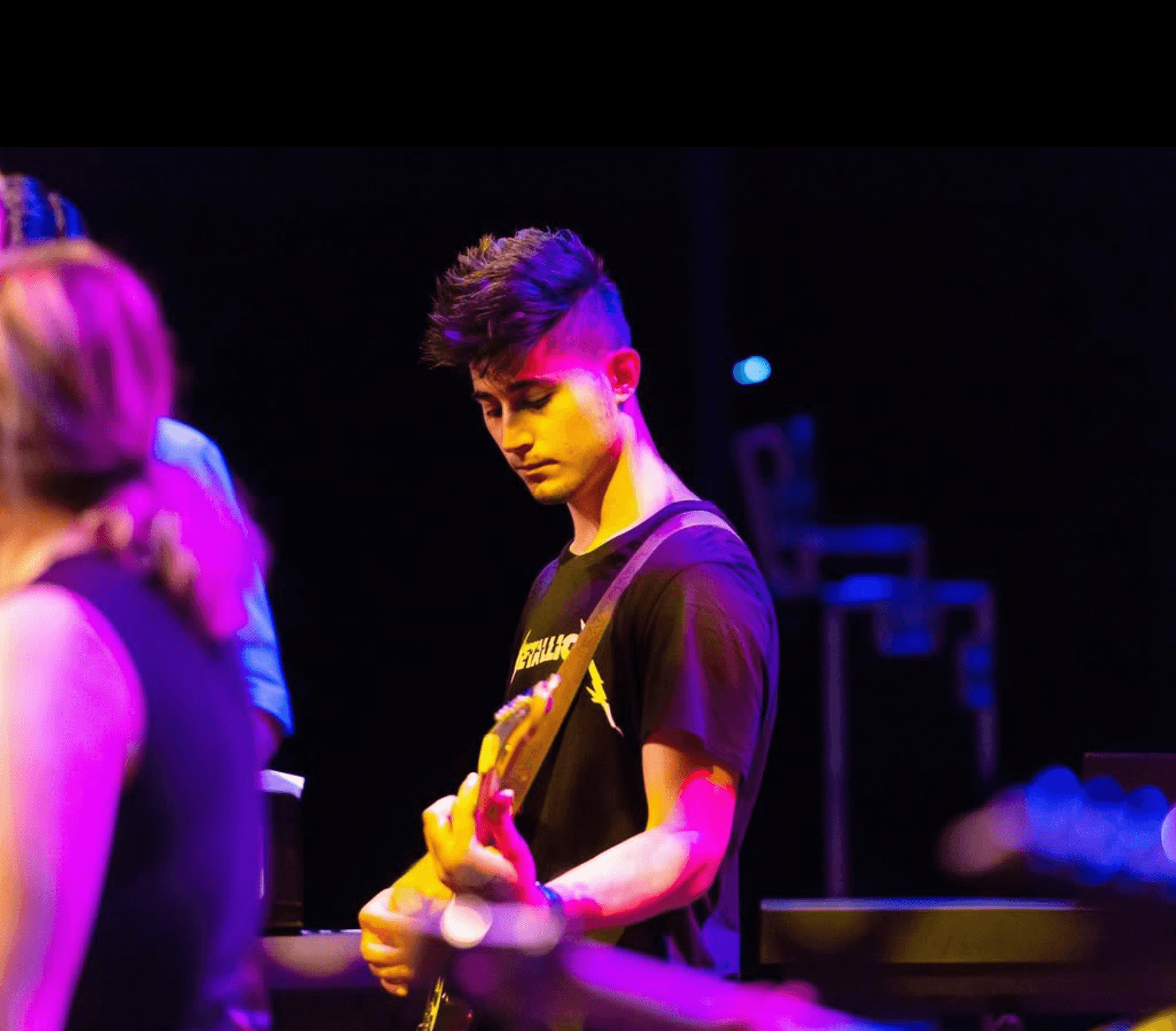 Ward playing guitar